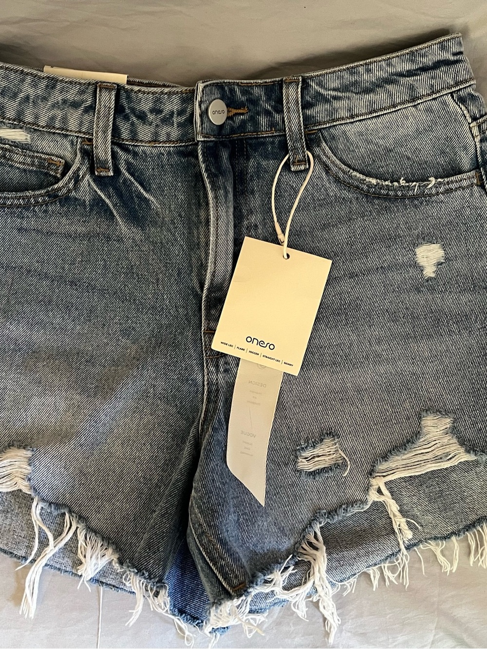 Oneso Distressed High-Waist Denim Shorts in Light Blue